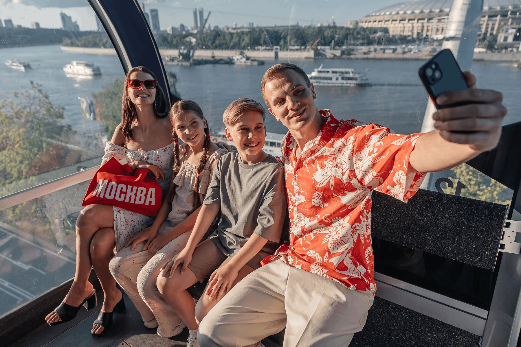 Family riding Moscow cable car