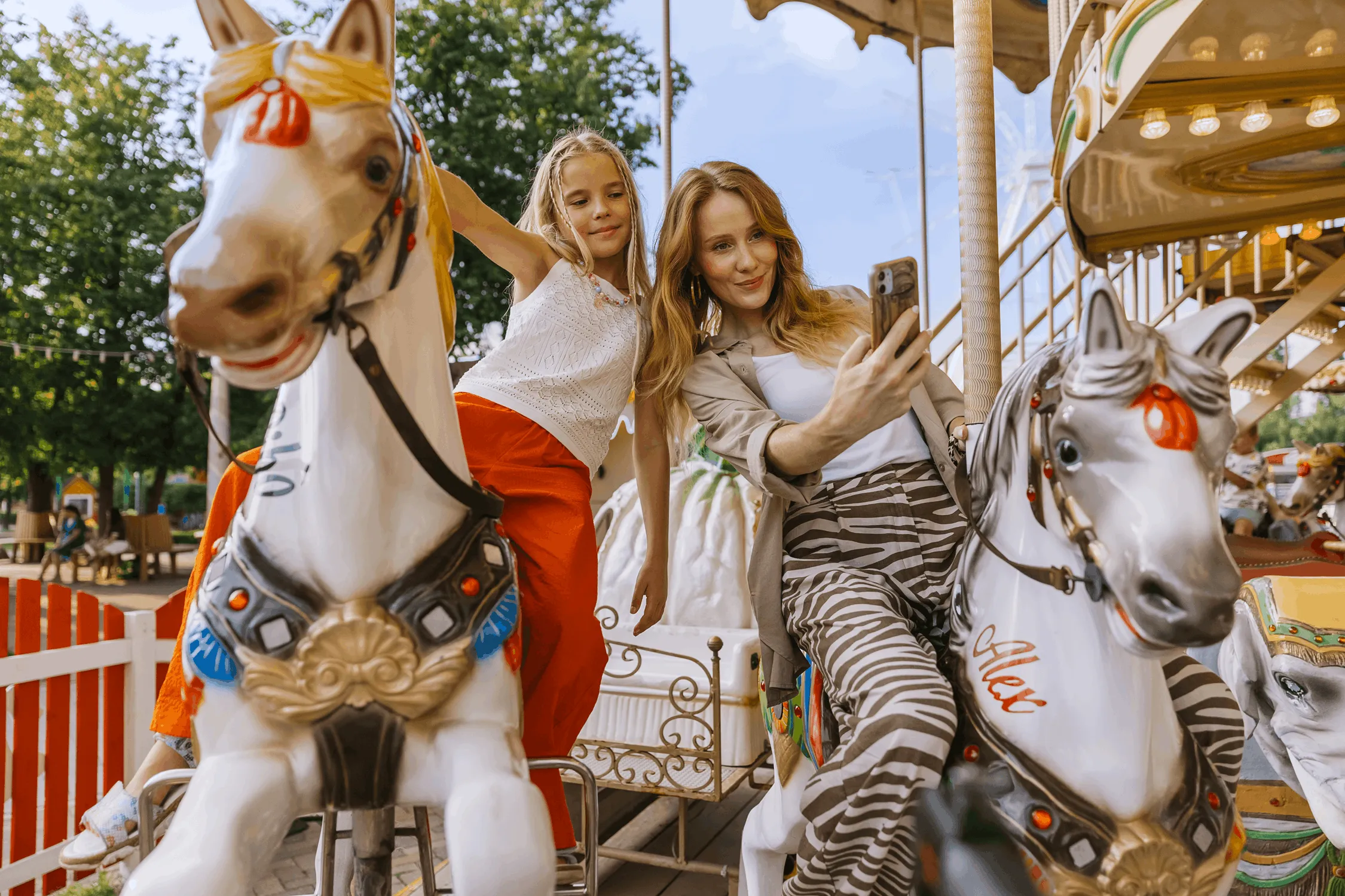 Family riding a carousel
