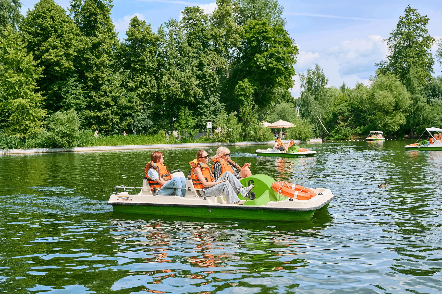 Family riding a boat in Tsaritsyno